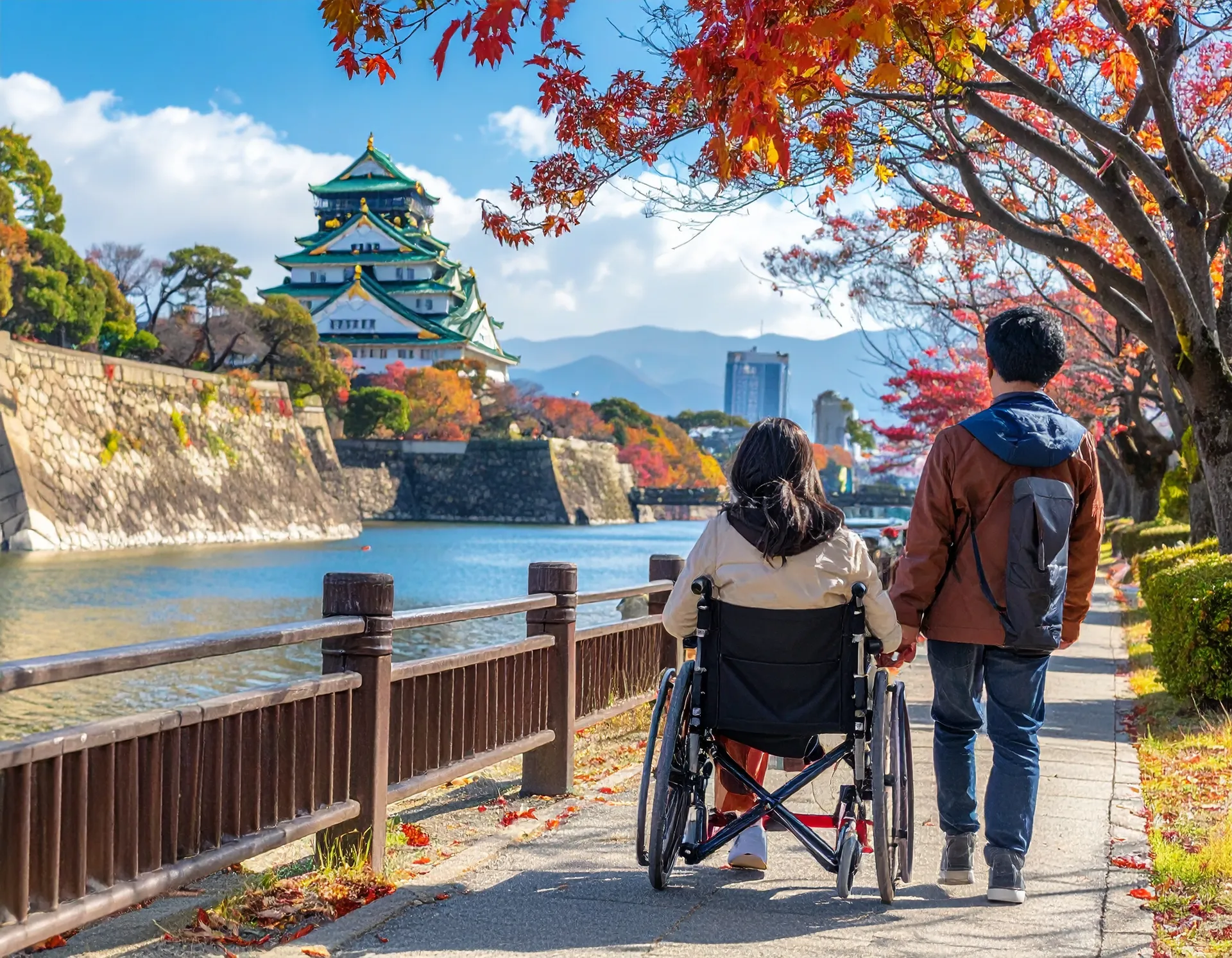Family sightseeing in Osaka together, including a wheelchair user